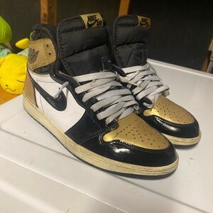 Air jordan gold toe 1’s Nike Black and White Sneakers